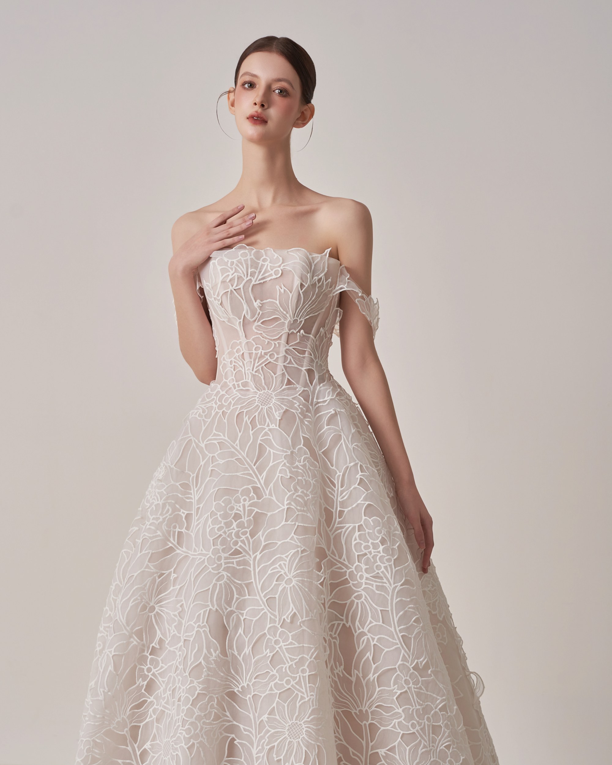 Strapless lace ball gown with a corset bodice