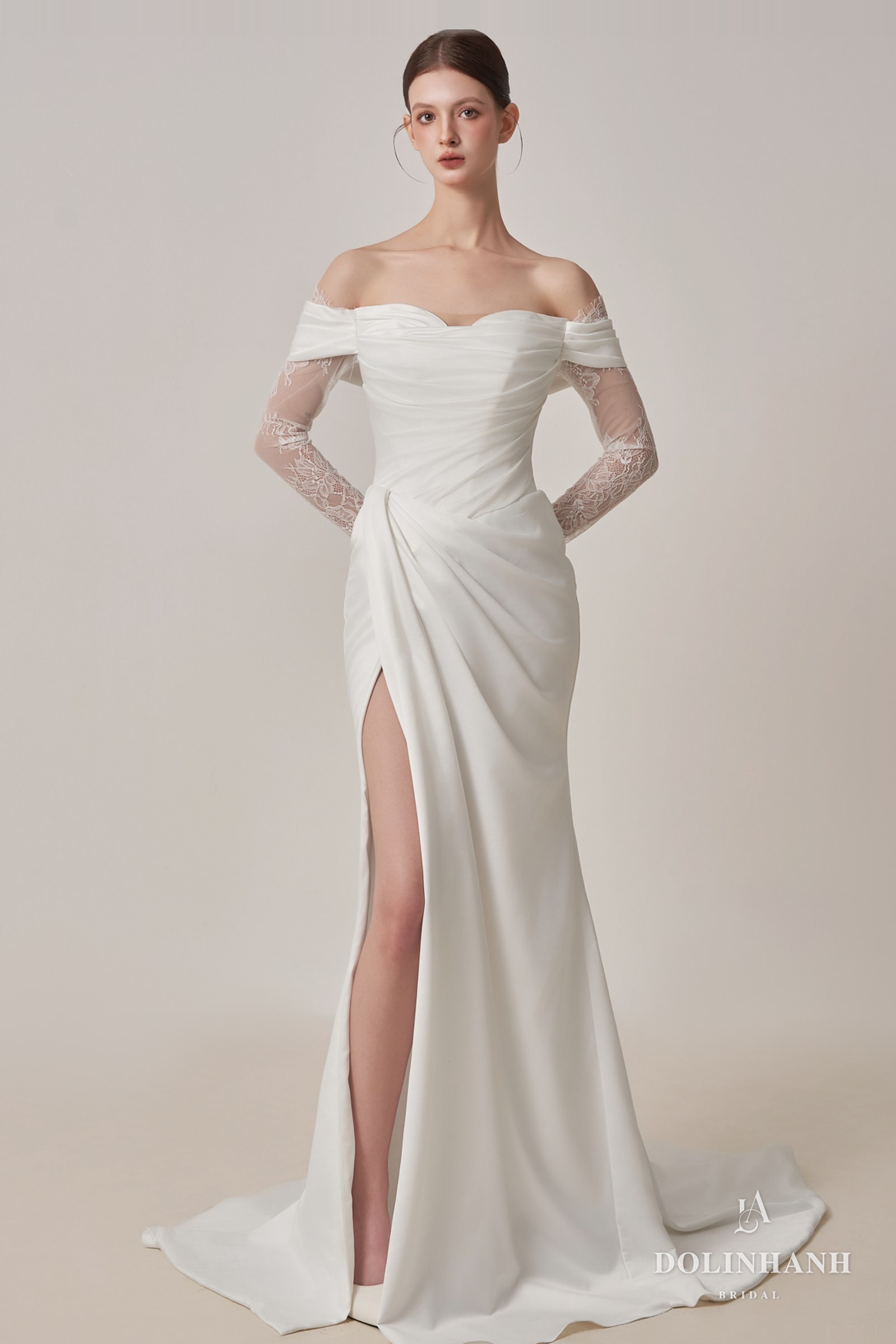 Draped off-the-shoulder satin gown with a front slit